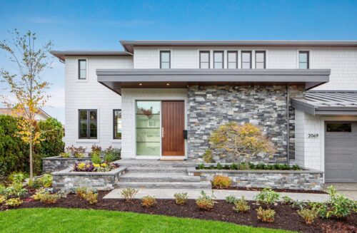 Stonework by Central Masonry | Home by Griffith Homes| Photo by LSP Media Exterior stone wall and planters using K2 Ocean Mist mixed with Natural Ledgestone - Courtenay BC