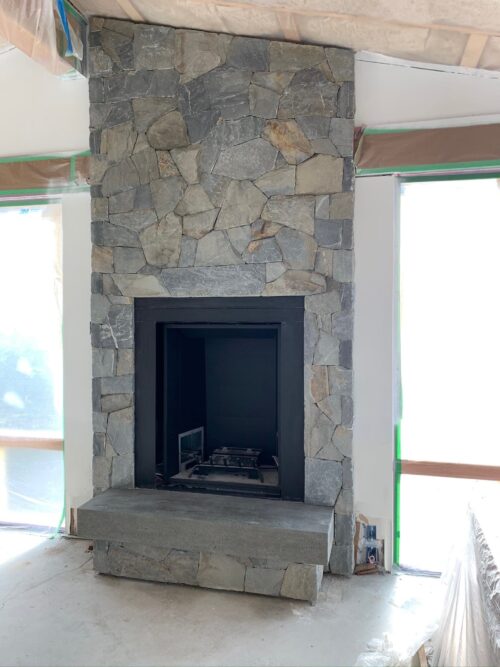 Interior fireplace facing using K2 Stone Arbutus Fieldstone - Campbell River BC